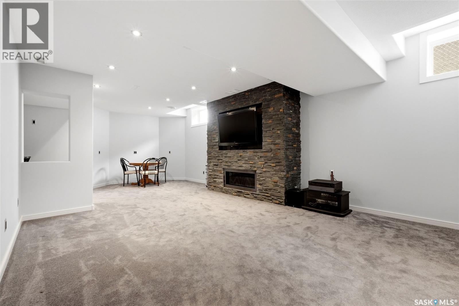 7211 Maple View Crescent, Regina, SK - Indoor With Fireplace