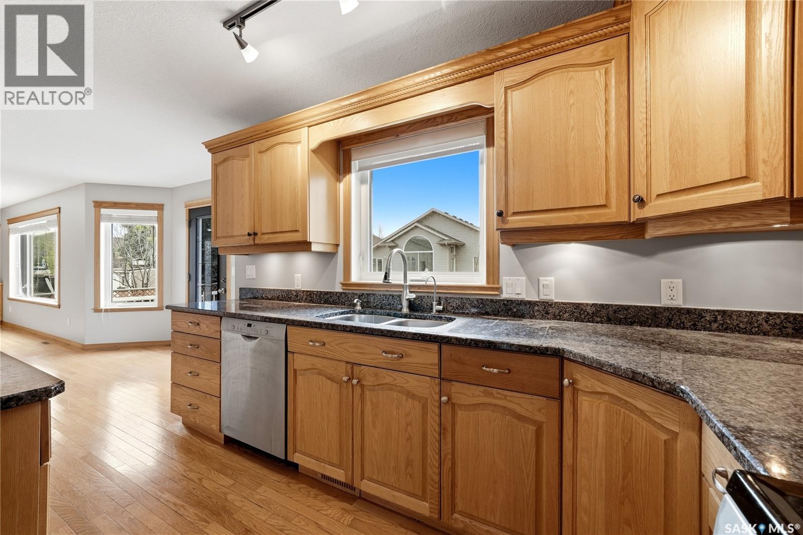 9382 Wascana Mews, Regina, SK - Indoor Photo Showing Kitchen With Double Sink