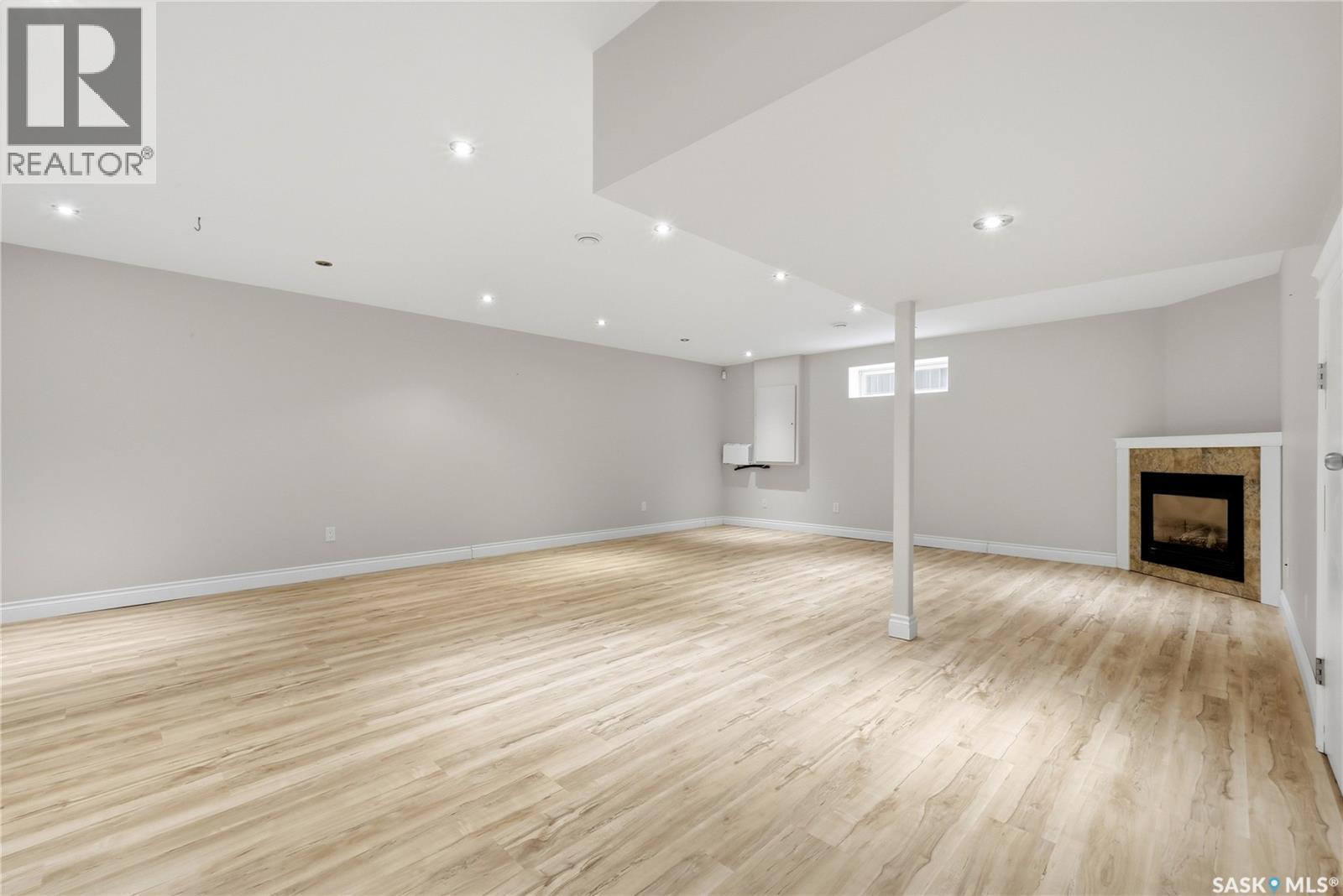 9382 Wascana Mews, Regina, SK - Indoor With Fireplace
