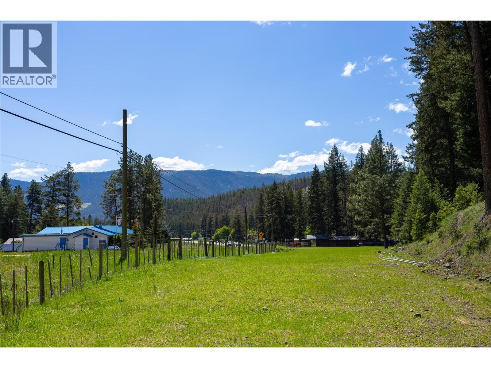 Large field for your horses to roam - 4644 97 Highway, Westwold, BC - Outdoor With View