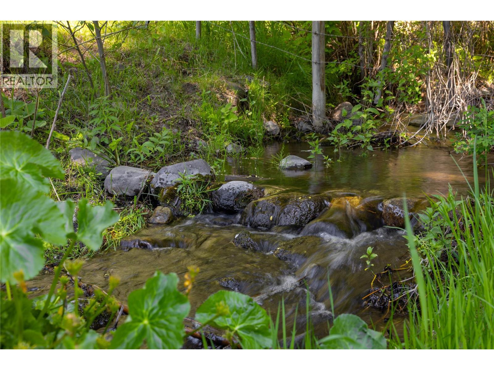 Creek flowing through far end of your property - 4644 97 Highway, Westwold, BC - Outdoor