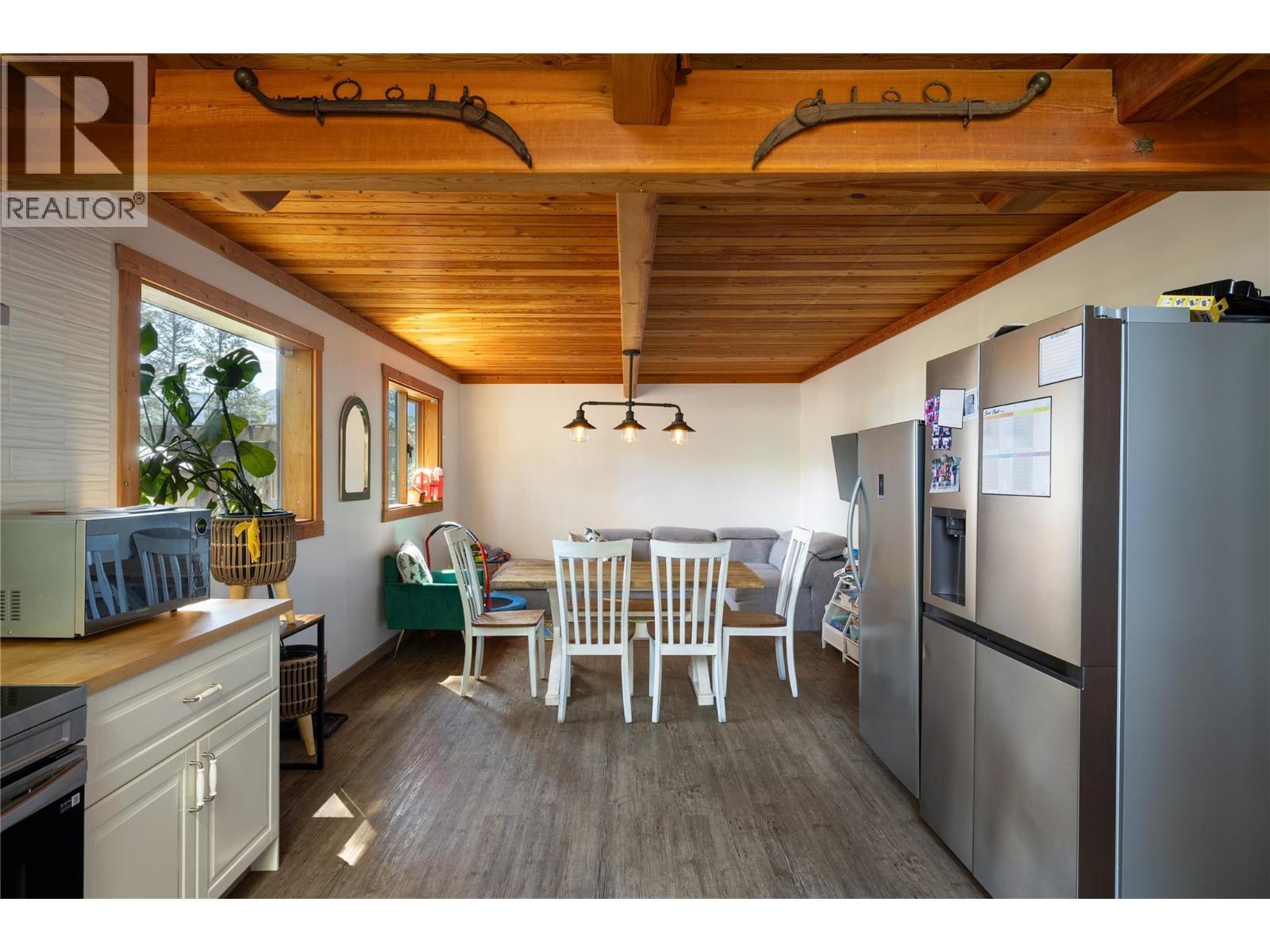 Kitchen looking toward dining area and family room - 4644 97 Highway, Westwold, BC - Indoor