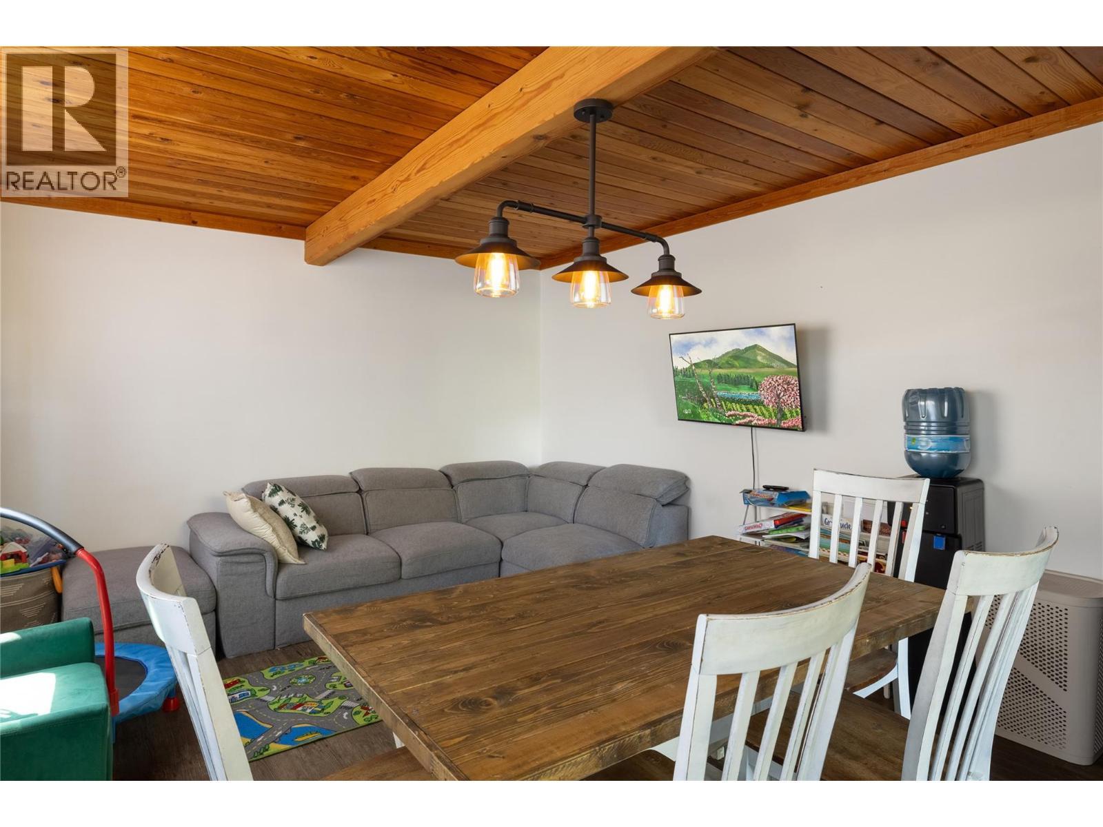 Dining area & Family room - 4644 97 Highway, Westwold, BC - Indoor Photo Showing Dining Room