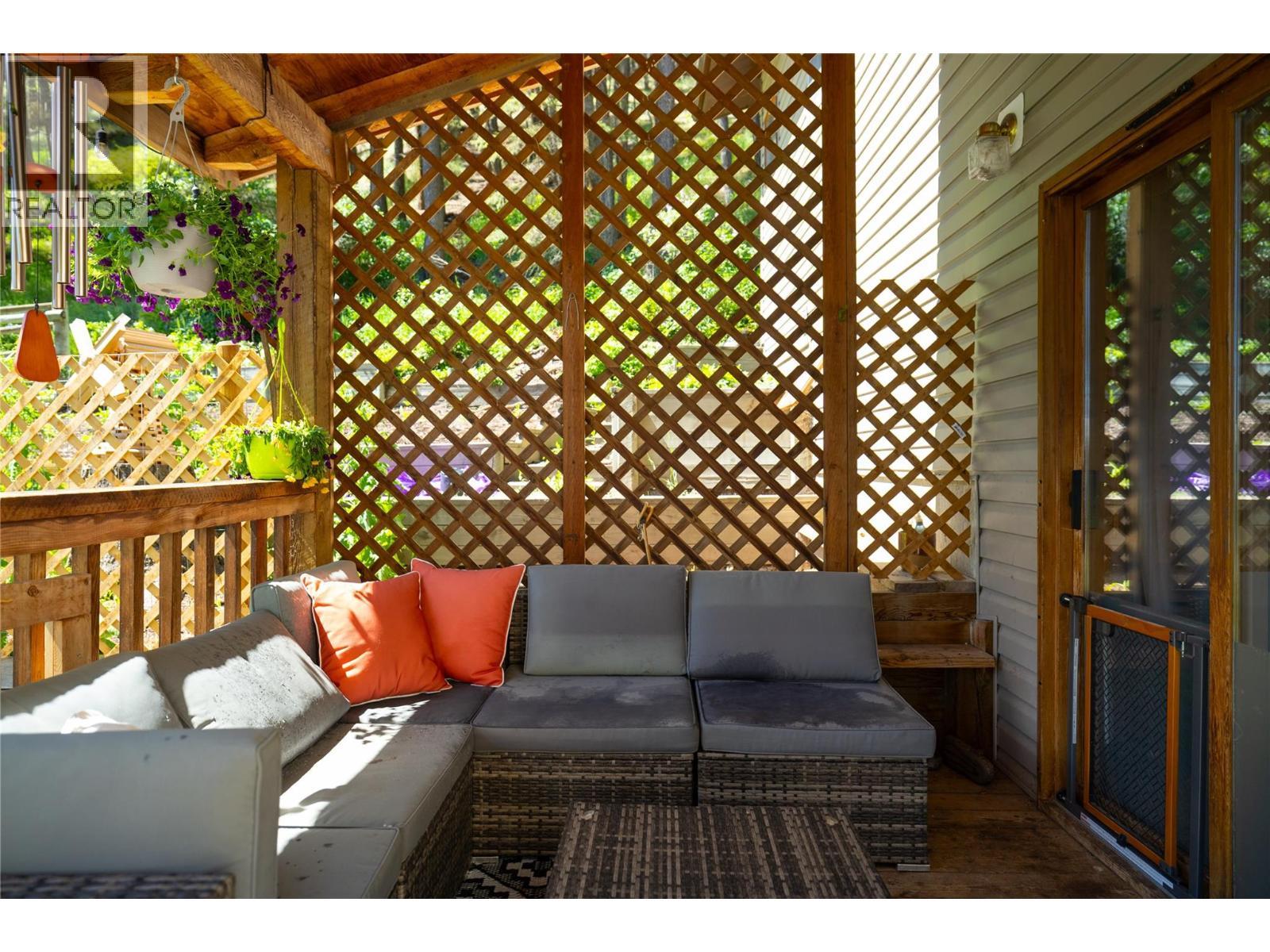 Covered side patio - 4644 97 Highway, Westwold, BC - Outdoor With Deck Patio Veranda