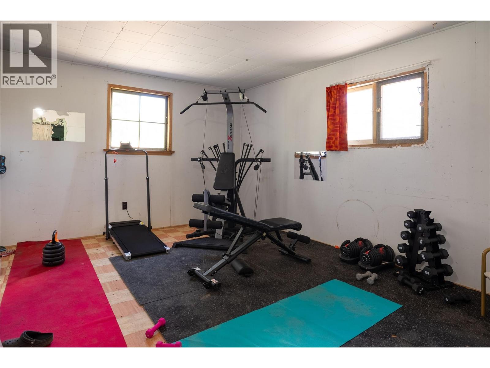 Gym in out building - 4644 97 Highway, Westwold, BC - Indoor Photo Showing Gym Room