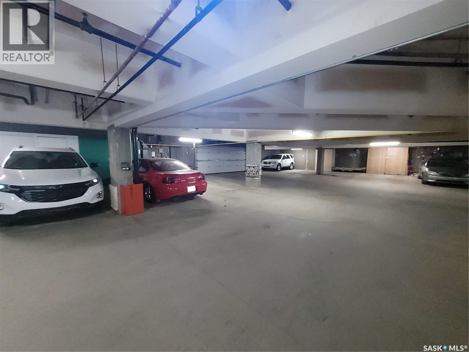 409 301 Cree Place, Saskatoon, SK - Indoor Photo Showing Garage