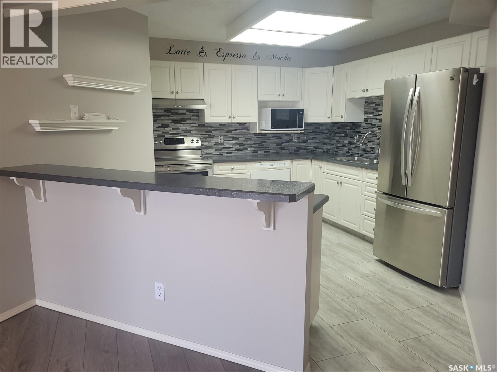 409 301 Cree Place, Saskatoon, SK - Indoor Photo Showing Kitchen With Upgraded Kitchen