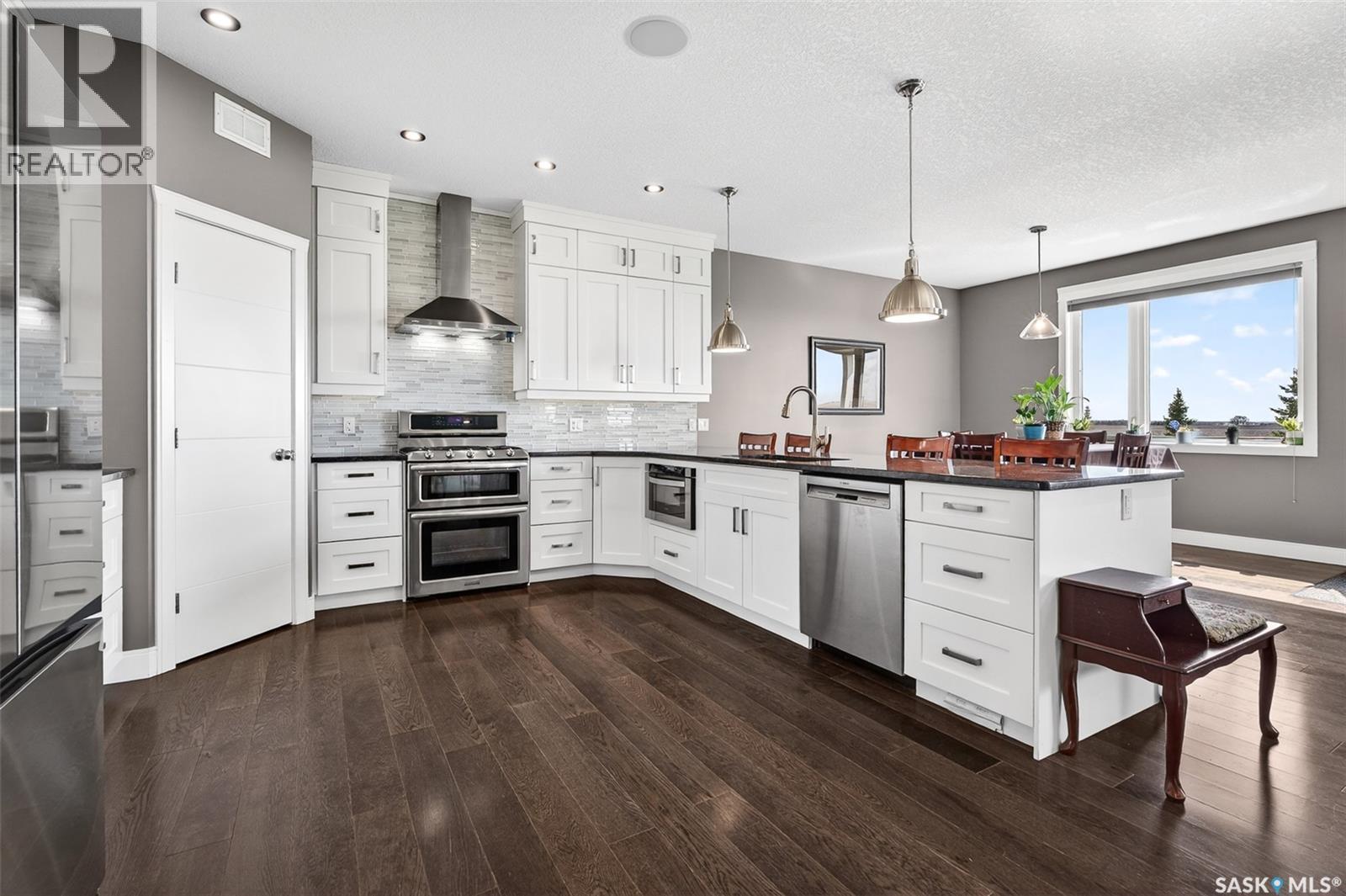 156 Iron Bridge Drive, Moose Jaw, SK - Indoor Photo Showing Kitchen With Upgraded Kitchen