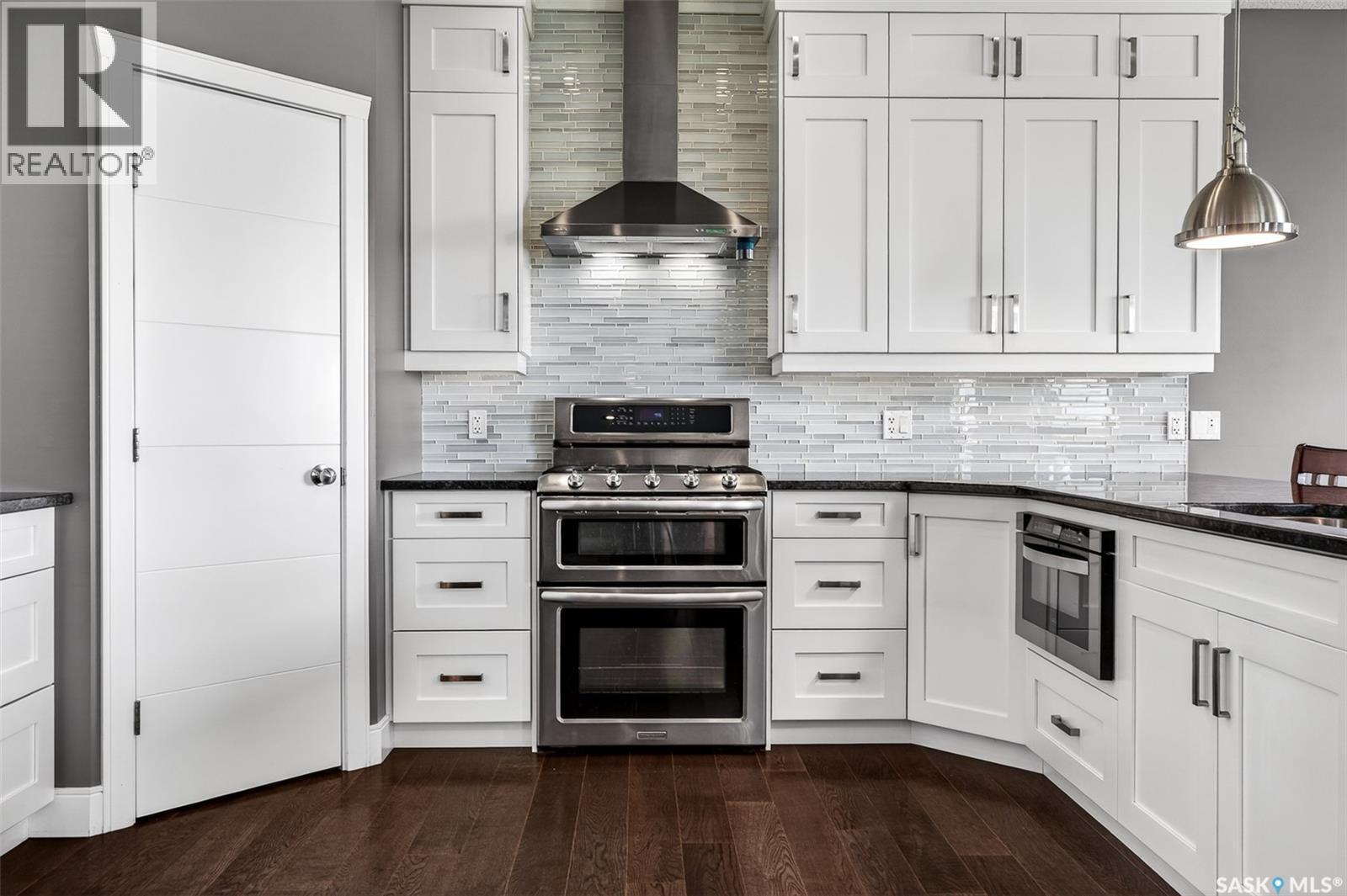 156 Iron Bridge Drive, Moose Jaw, SK - Indoor Photo Showing Kitchen With Upgraded Kitchen