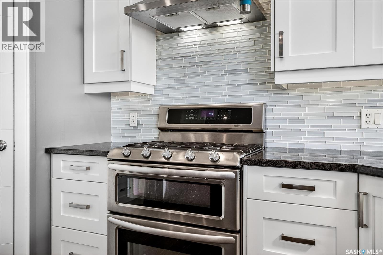 156 Iron Bridge Drive, Moose Jaw, SK - Indoor Photo Showing Kitchen With Upgraded Kitchen