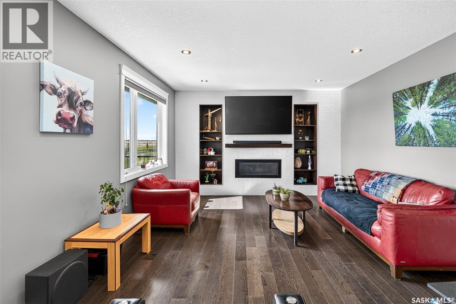 156 Iron Bridge Drive, Moose Jaw, SK - Indoor Photo Showing Living Room With Fireplace