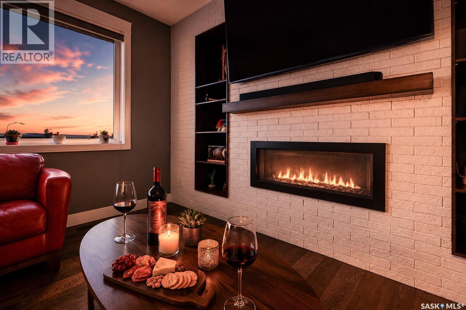 156 Iron Bridge Drive, Moose Jaw, SK - Indoor Photo Showing Living Room With Fireplace