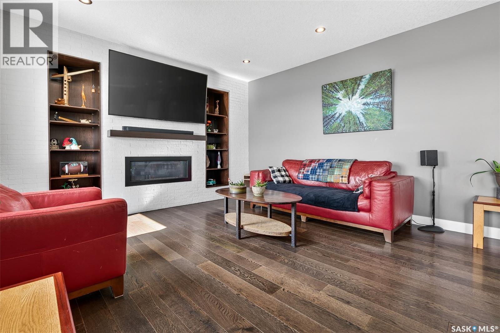 156 Iron Bridge Drive, Moose Jaw, SK - Indoor Photo Showing Living Room With Fireplace