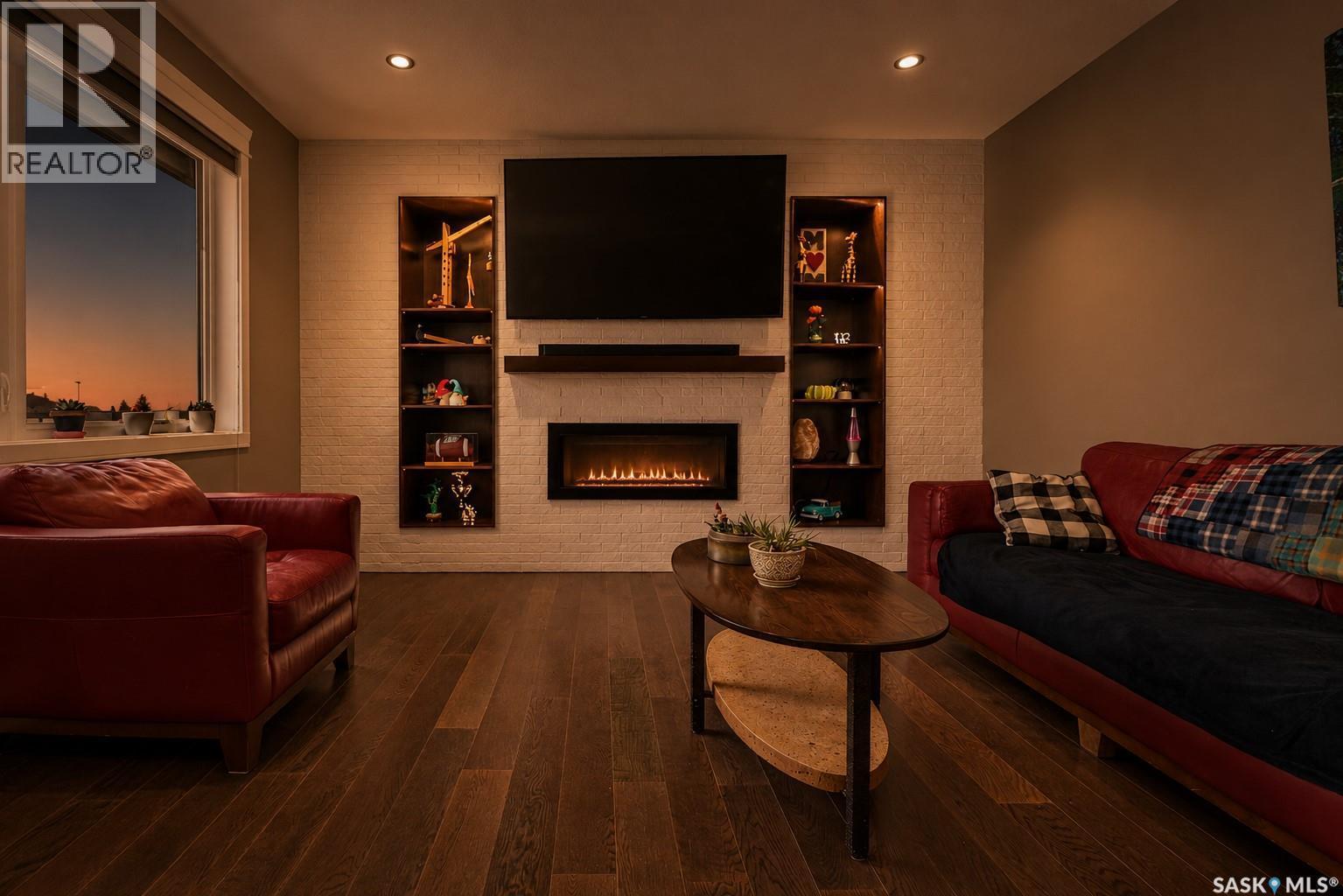 156 Iron Bridge Drive, Moose Jaw, SK - Indoor Photo Showing Living Room With Fireplace