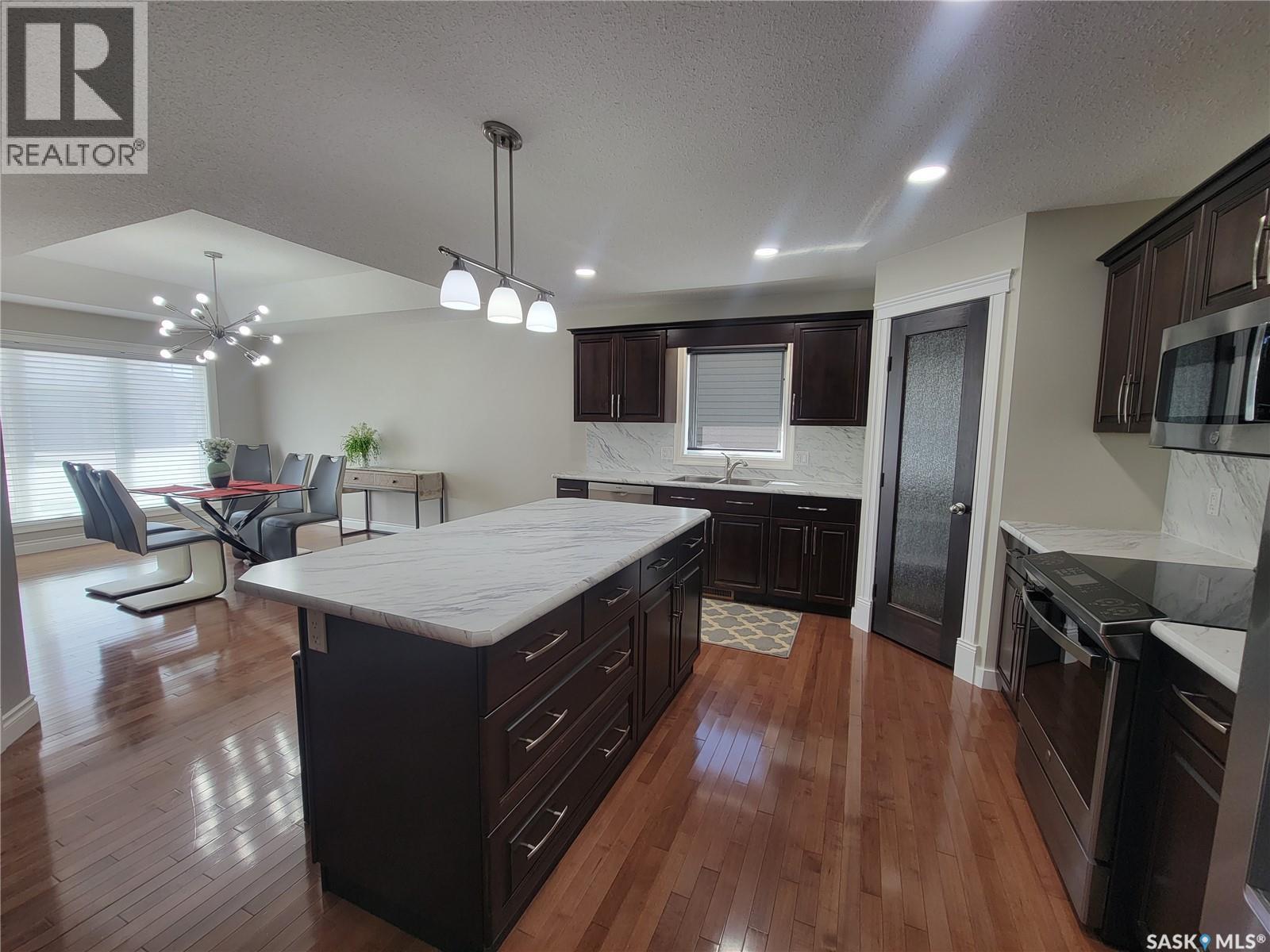 1 5352 Progress Street, Macklin, SK - Indoor Photo Showing Kitchen With Stainless Steel Kitchen With Upgraded Kitchen