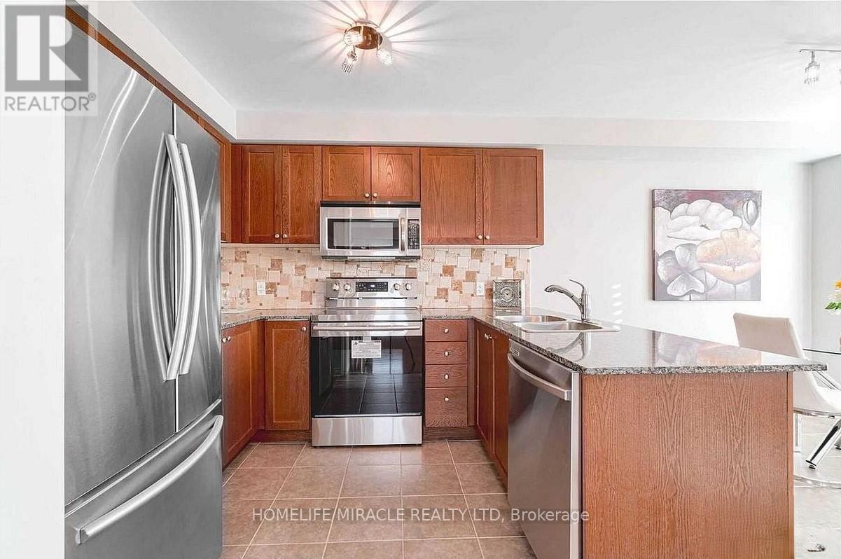 1439 Costigan Road, Milton, ON - Indoor Photo Showing Kitchen With Stainless Steel Kitchen