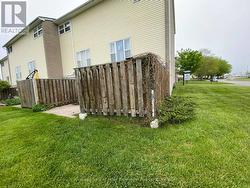 West side of condo, patio area. -