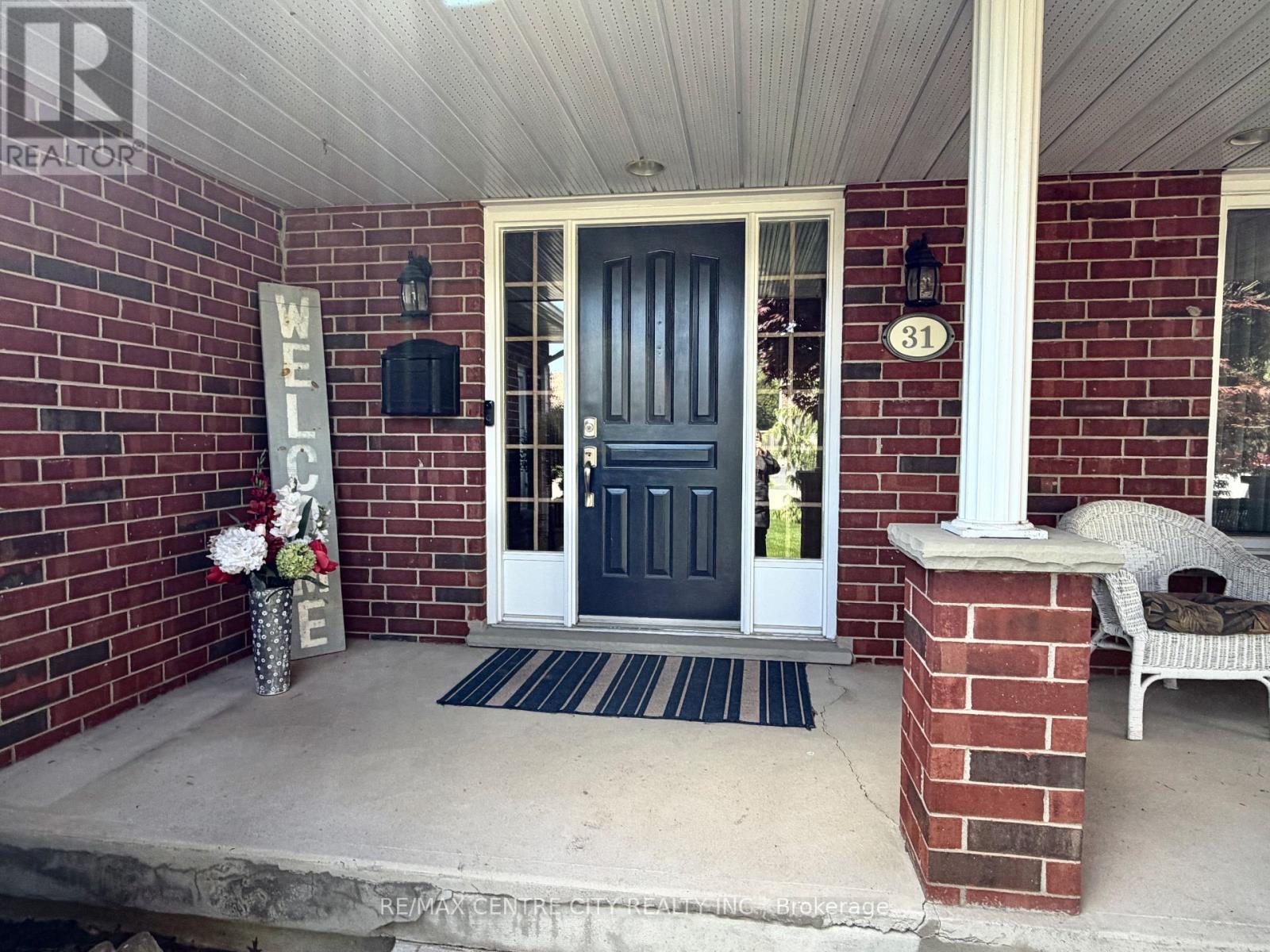 FRONT ENTRANCE DETAIL - 31 Cavanaugh Crescent, St. Thomas, ON - Outdoor With Deck Patio Veranda