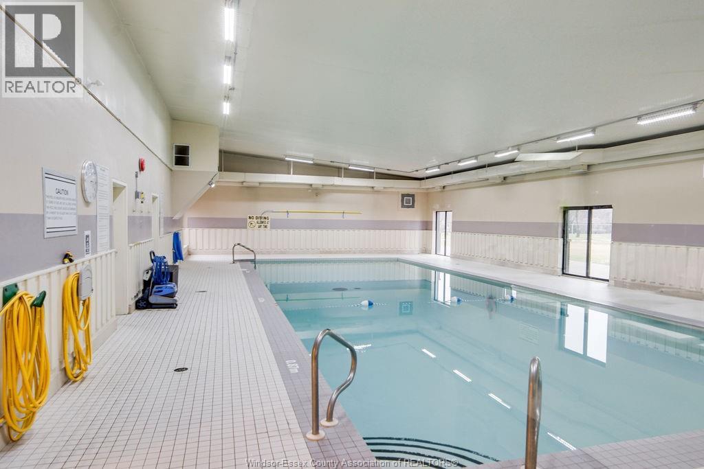 9099 Riverside Drive Unit# 221 E, Windsor, ON - Indoor Photo Showing Other Room With In Ground Pool