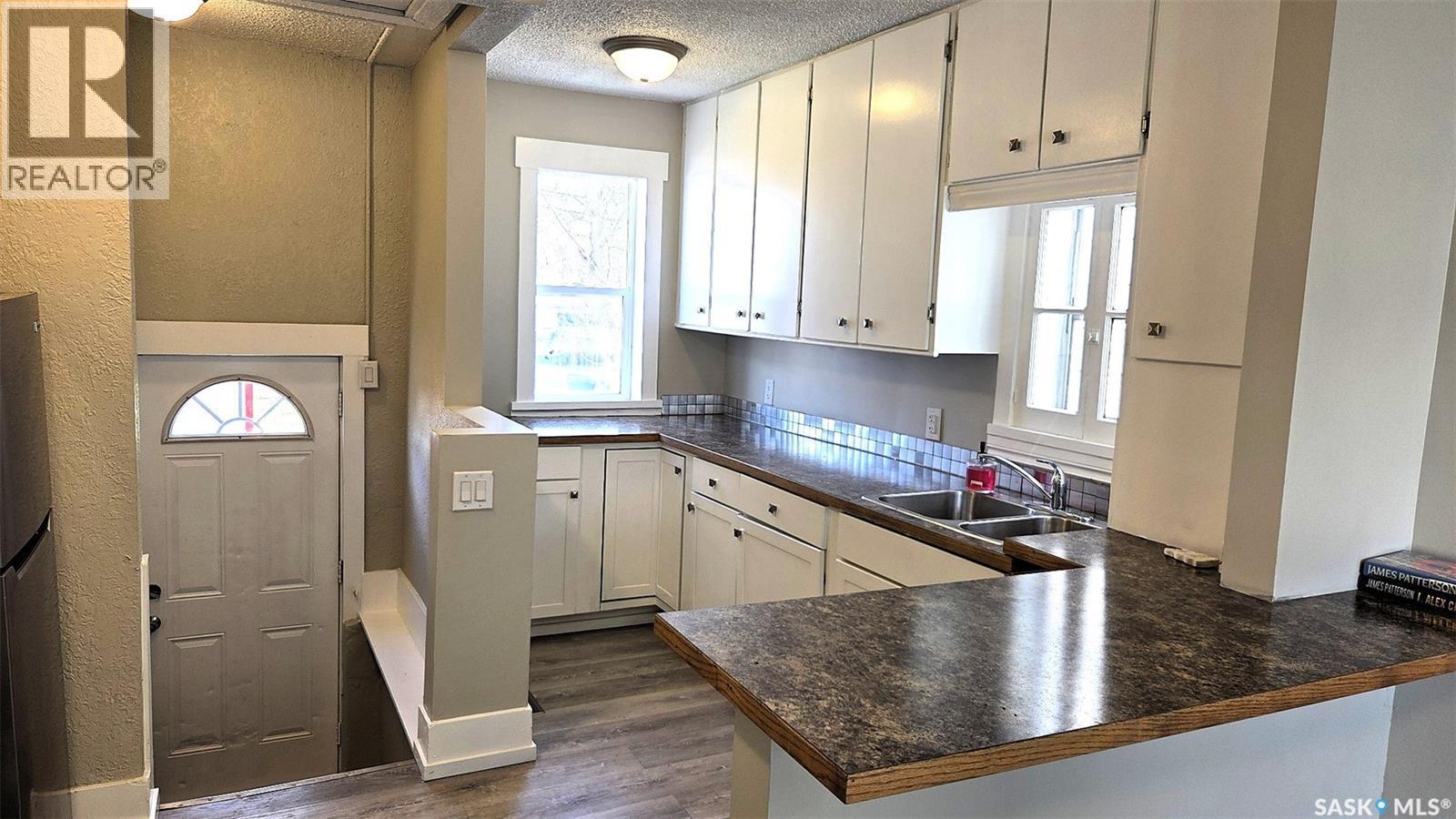 2023 Atkinson Street, Regina, SK - Indoor Photo Showing Kitchen With Double Sink