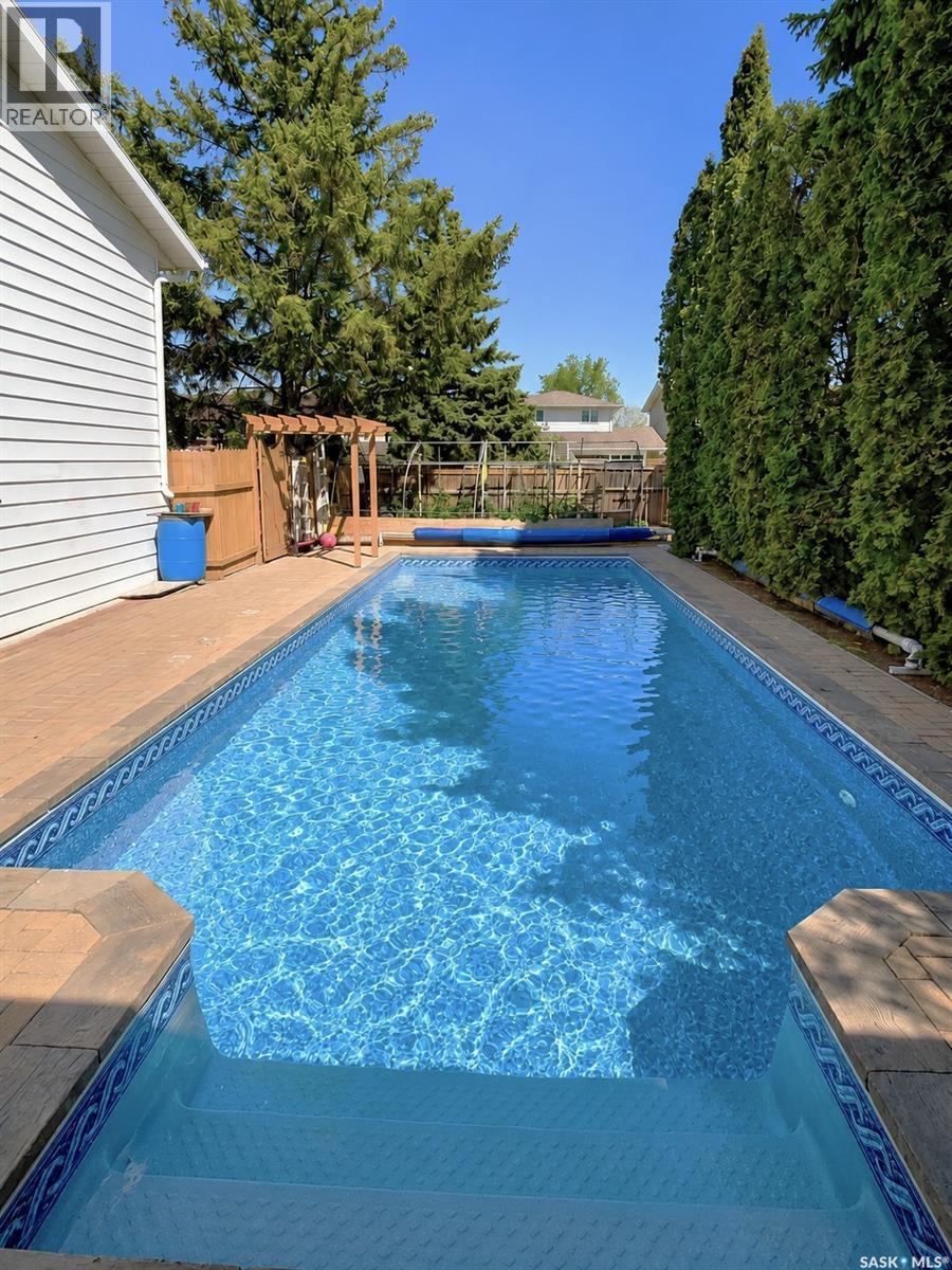 66 Leslie Place, Regina, SK - Outdoor With In Ground Pool