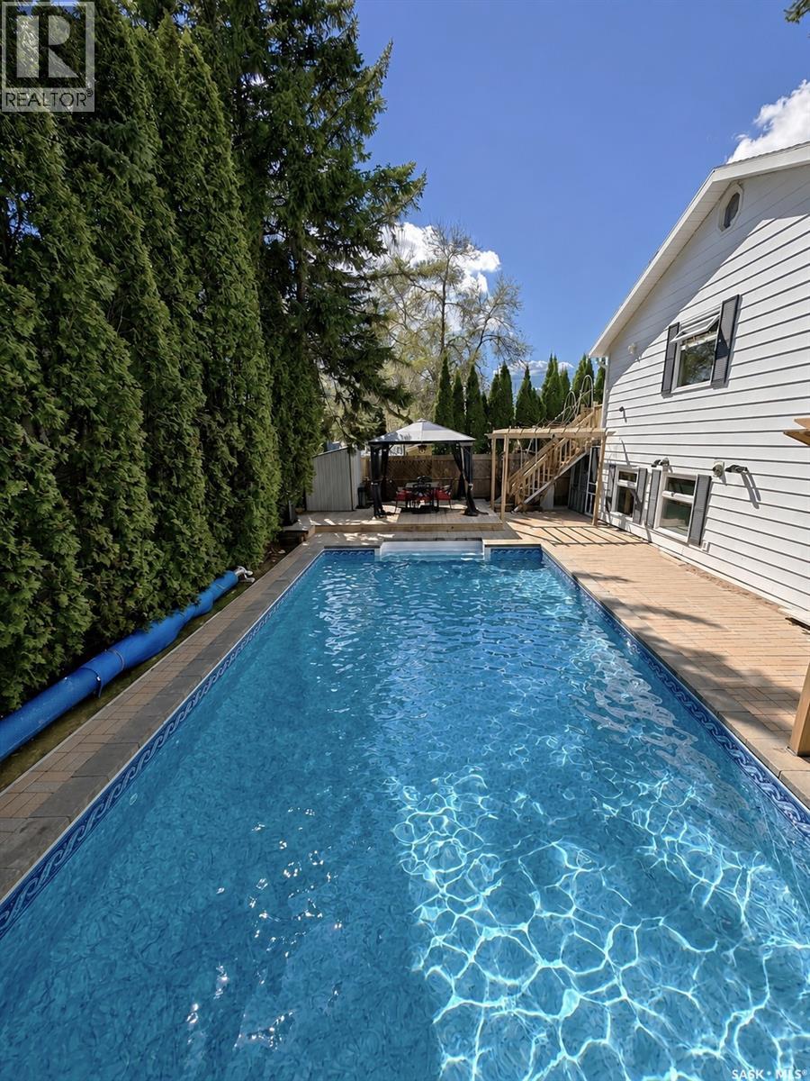 66 Leslie Place, Regina, SK - Outdoor With In Ground Pool