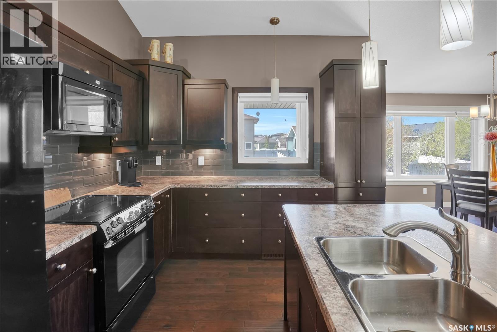 4117 Green Rose Crescent, Regina, SK - Indoor Photo Showing Kitchen With Double Sink