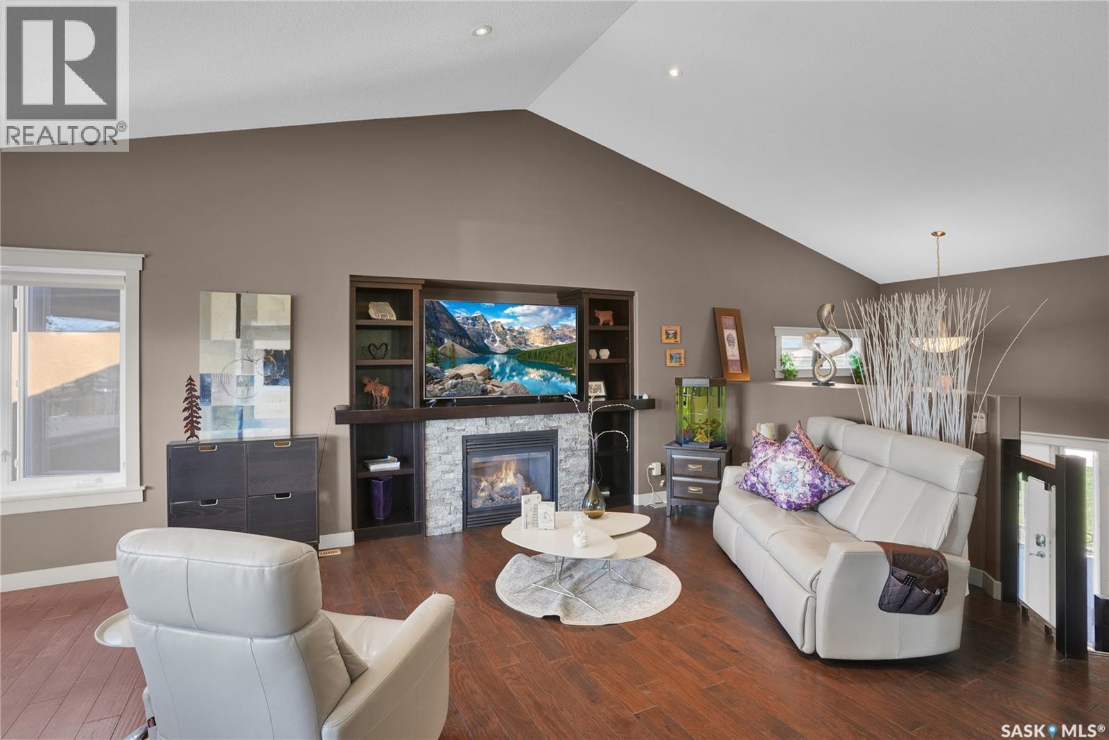 4117 Green Rose Crescent, Regina, SK - Indoor Photo Showing Living Room With Fireplace