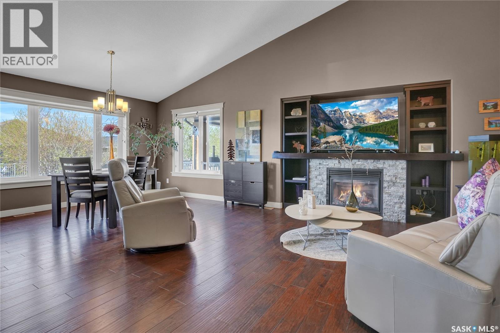 4117 Green Rose Crescent, Regina, SK - Indoor Photo Showing Living Room With Fireplace