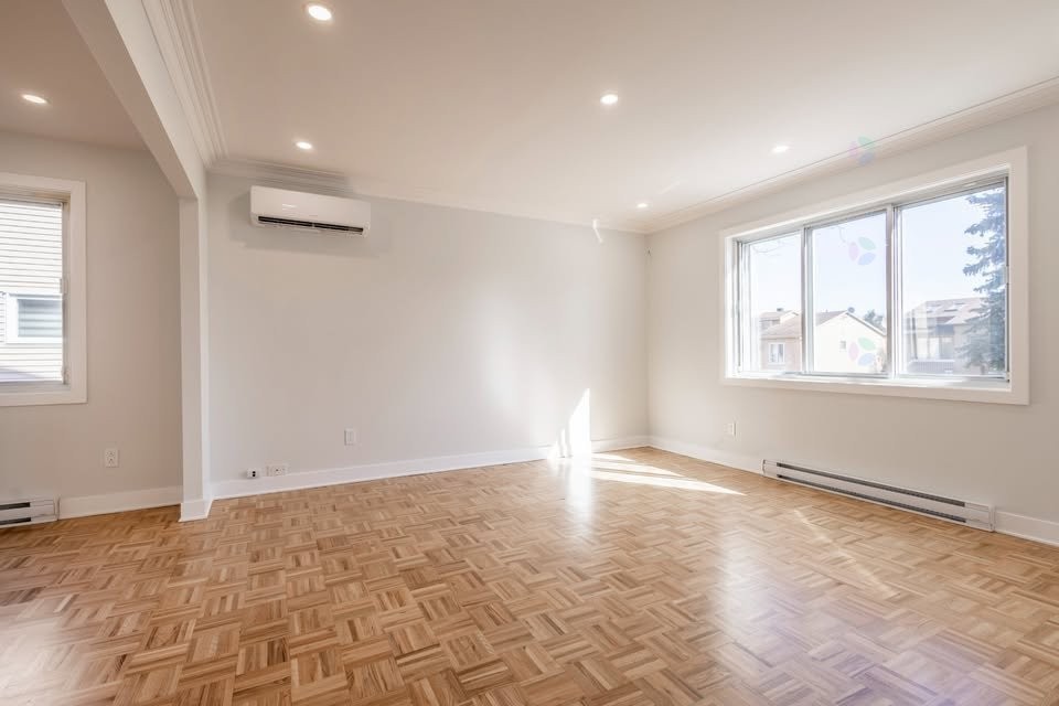 Living Room - 12404 Rue Ferdinand-Bastien, Montréal (Rivière-Des-Prairies/Pointe-Aux-Trembles), QC - Indoor Photo Showing Other Room