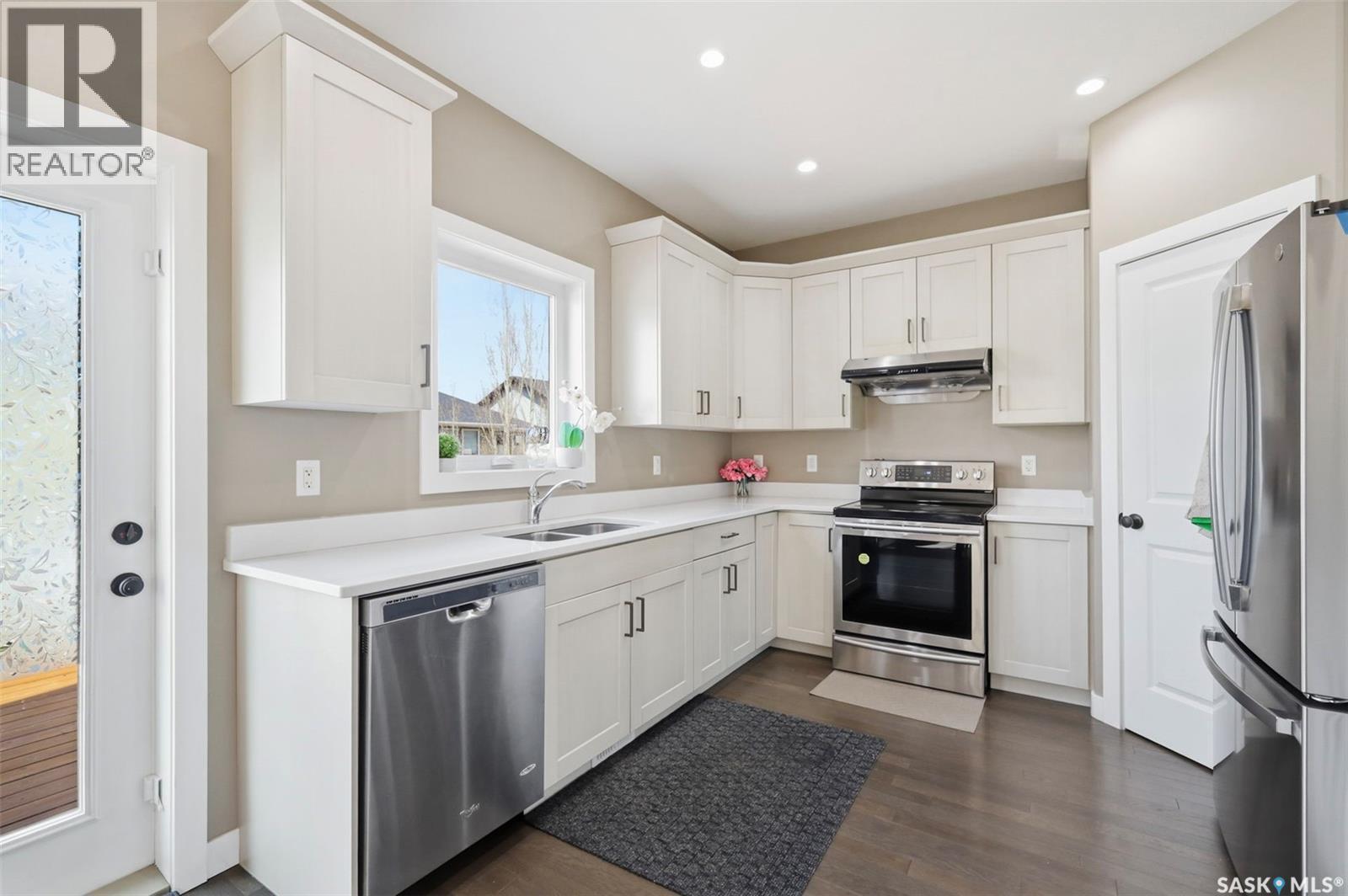 211 Baltzan Boulevard, Saskatoon, SK - Indoor Photo Showing Kitchen With Stainless Steel Kitchen With Double Sink