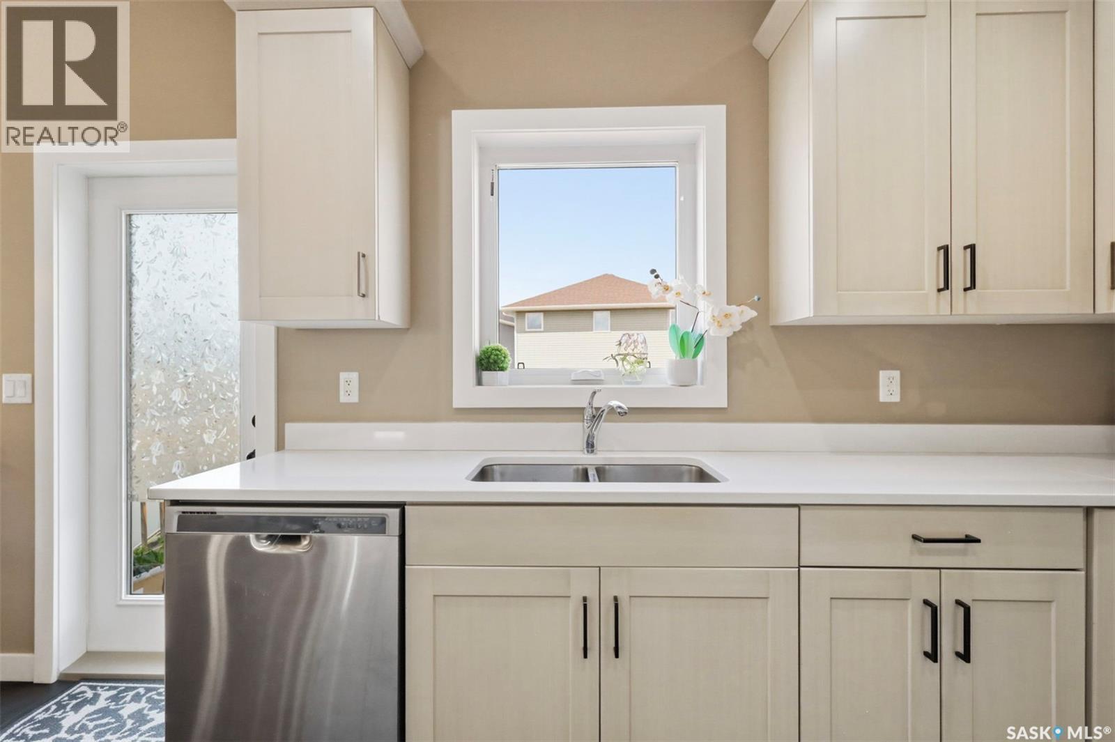 211 Baltzan Boulevard, Saskatoon, SK - Indoor Photo Showing Kitchen With Double Sink