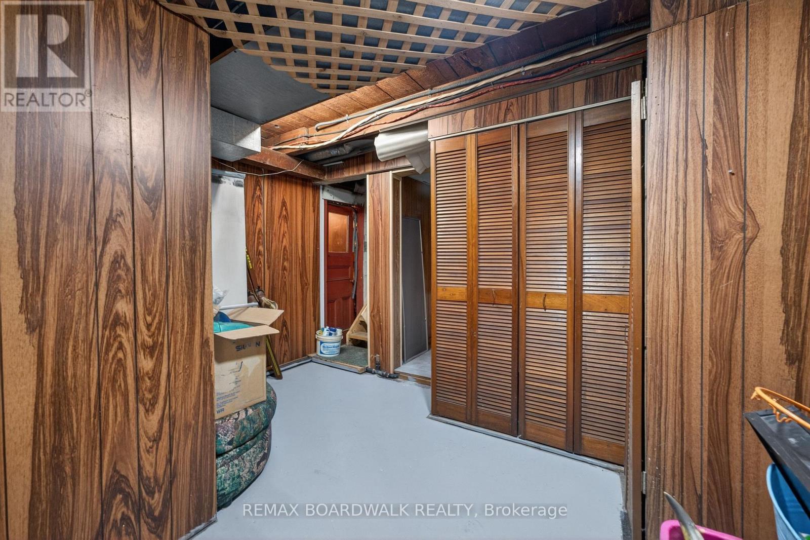 Basement Den, Stairs to Front Entrance - 92 Orvigale Road, Ottawa, ON - Indoor Photo Showing Other Room