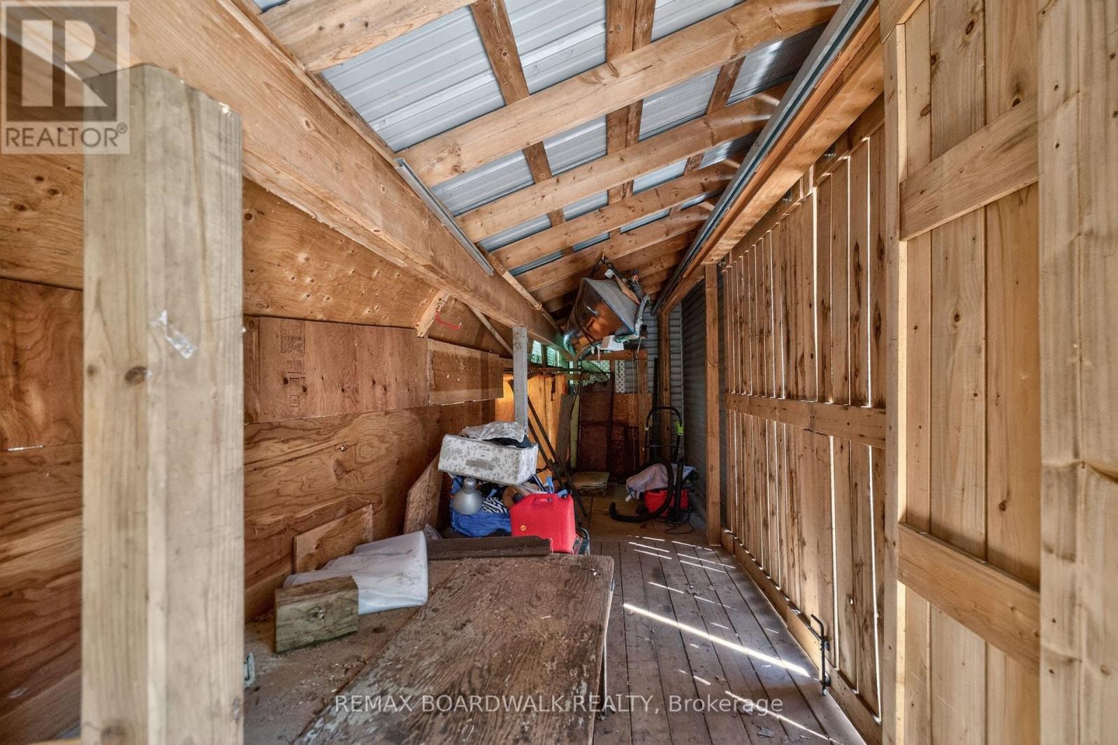 Custom Built Toy Storage to Secure Canoes etc. - 92 Orvigale Road, Ottawa, ON - Indoor Photo Showing Other Room