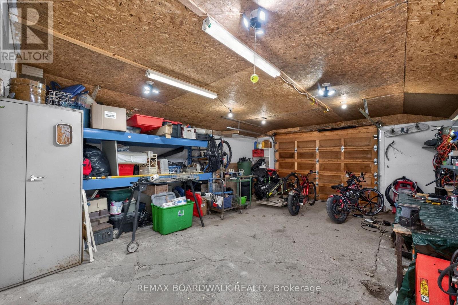 Oversized Detached Garage (16'10 x 31'9) - 92 Orvigale Road, Ottawa, ON - Indoor Photo Showing Garage
