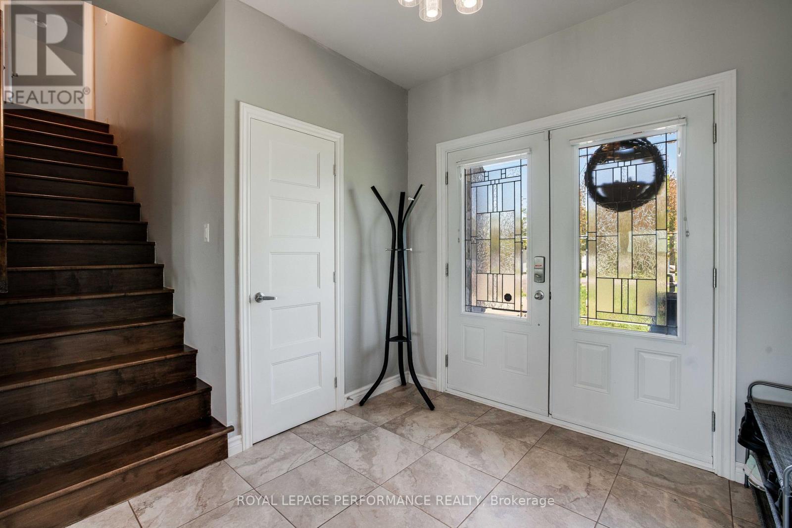 Generous foyer with stairway to loft / family rm - 88 Pendleton Street, Champlain, ON - Indoor Photo Showing Other Room