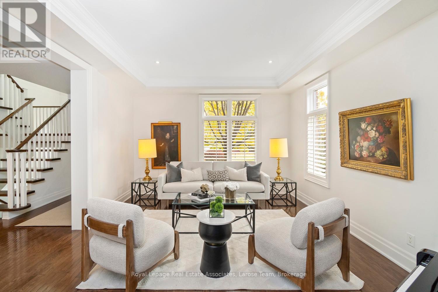 Elegant Living Room with Abundant Light - 562 Gladwyne Court, Mississauga, ON - Indoor Photo Showing Living Room