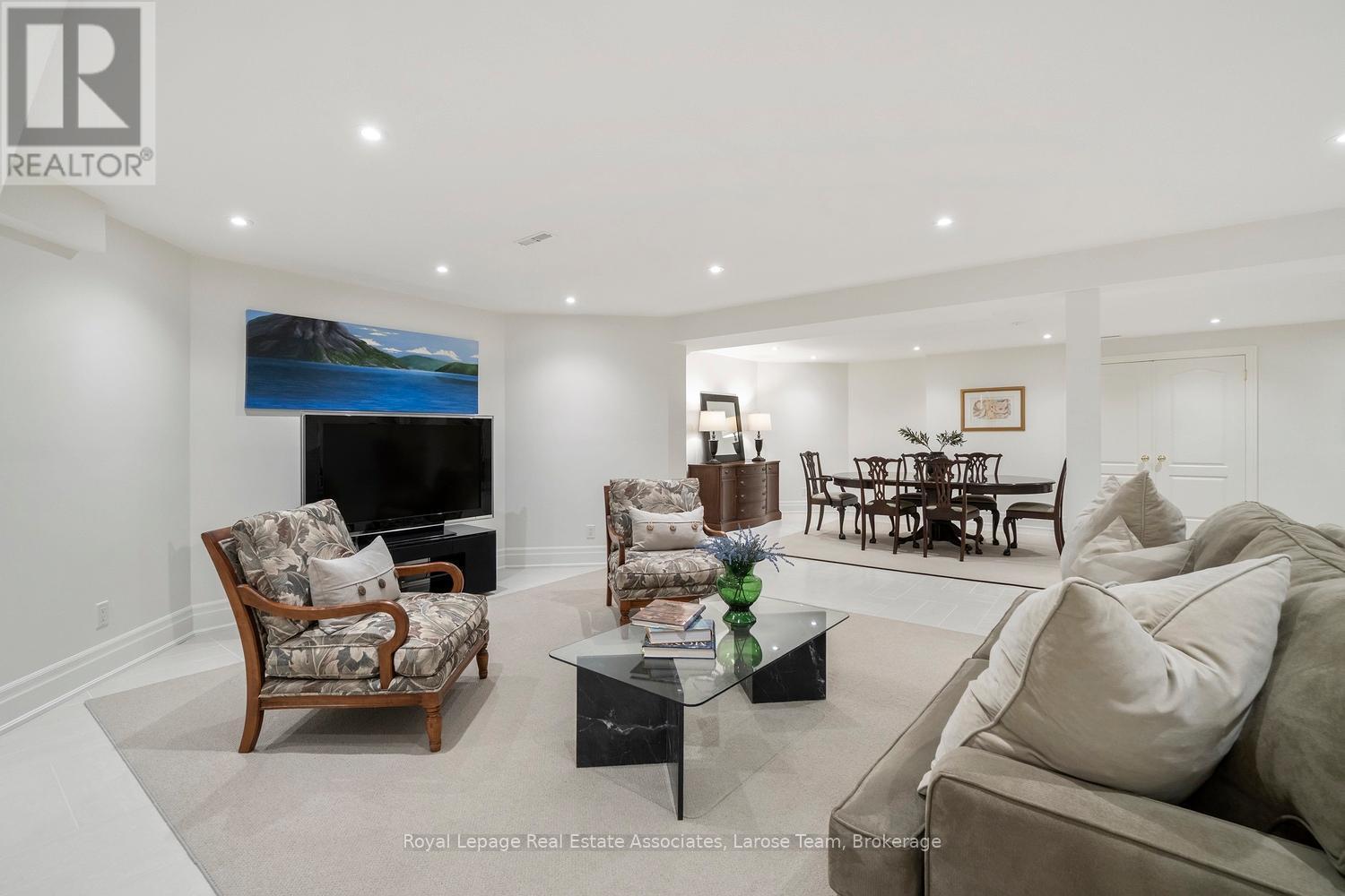 Basement with Large, Open Space/Porcelain Tiles - 562 Gladwyne Court, Mississauga, ON - Indoor Photo Showing Living Room