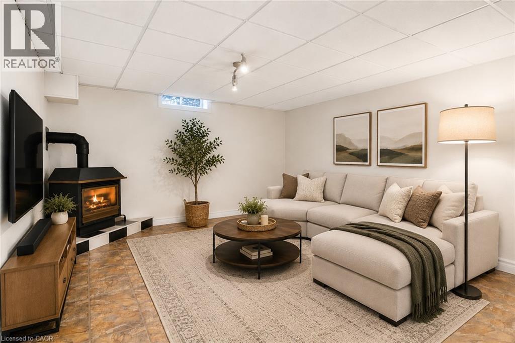 Virtually Staged - 144 Bellingham Drive, Hamilton, ON - Indoor With Fireplace
