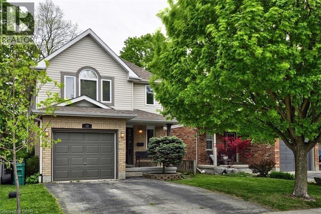 Two-story residence featuring light-toned siding and brick accents - 12 Karalee Crescent, Cambridge, ON - Outdoor