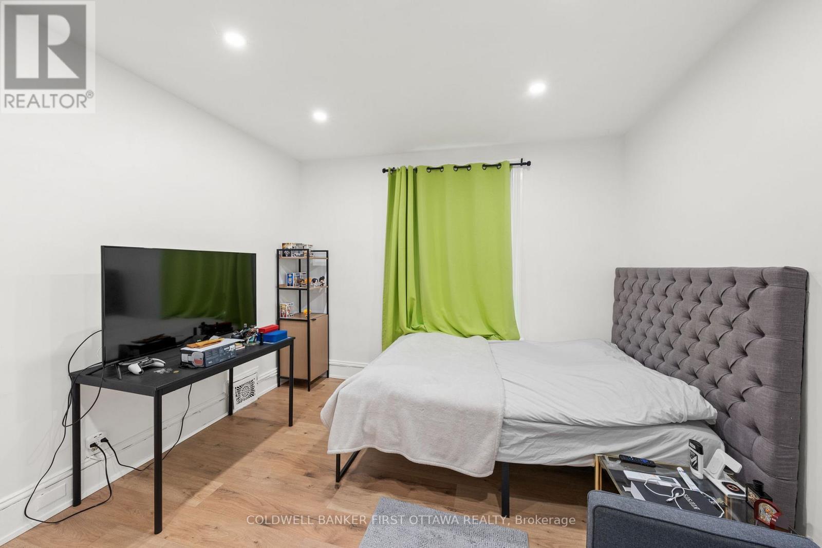Expansive window & pot lights above. - 277 Arlington Avenue, Ottawa, ON - Indoor Photo Showing Bedroom