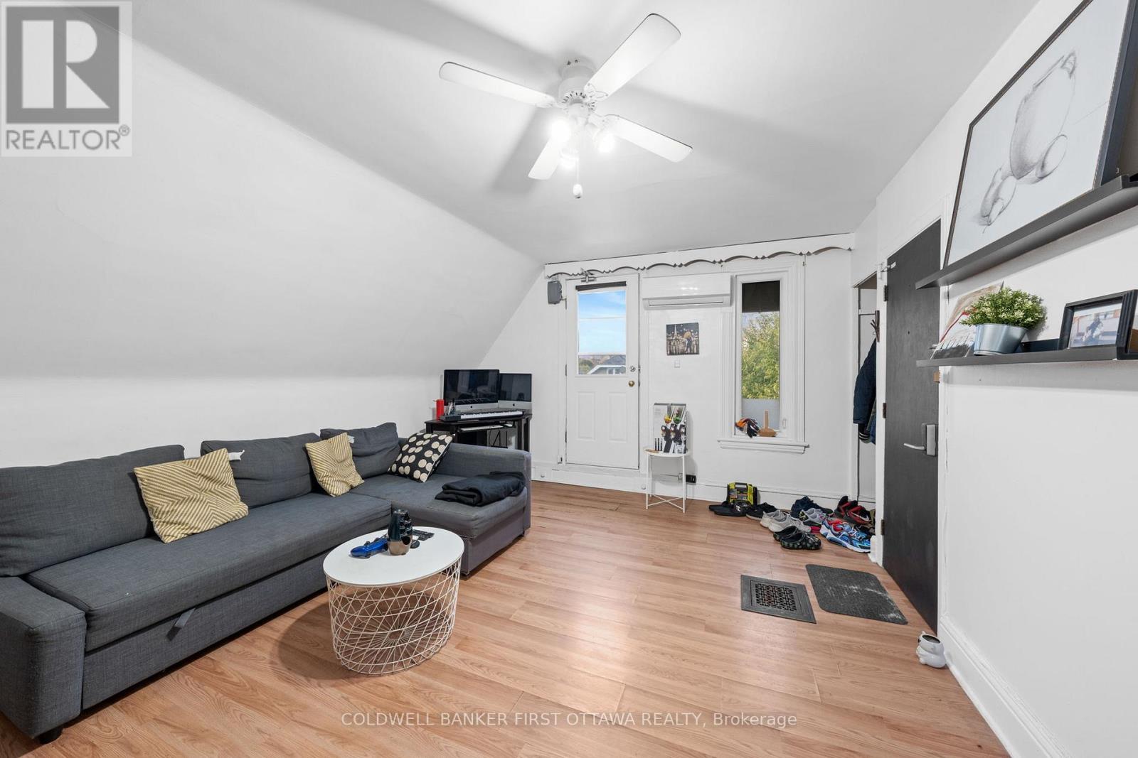 Livingroom w fanfixture above & fire escape access - 277 Arlington Avenue, Ottawa, ON - Indoor Photo Showing Other Room