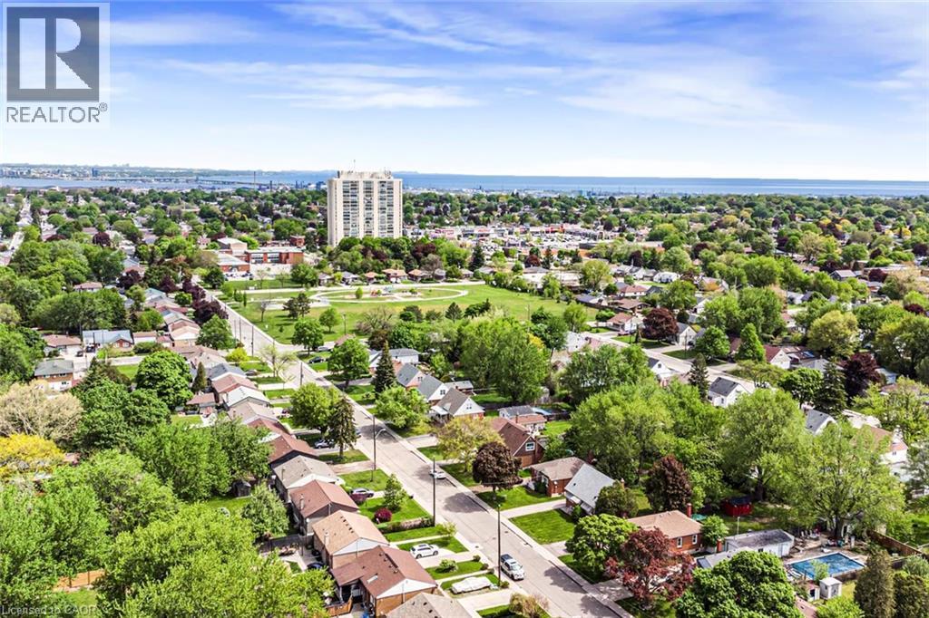 Aerial perspective showcasing residential streets lined with established homes and mature trees - 435 East 36Th Street, Hamilton, ON - Outdoor With View