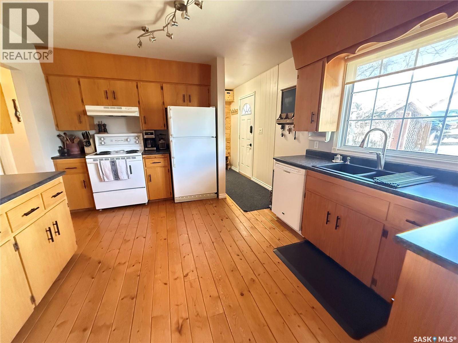 1009 First Street, Estevan, SK - Indoor Photo Showing Kitchen With Double Sink