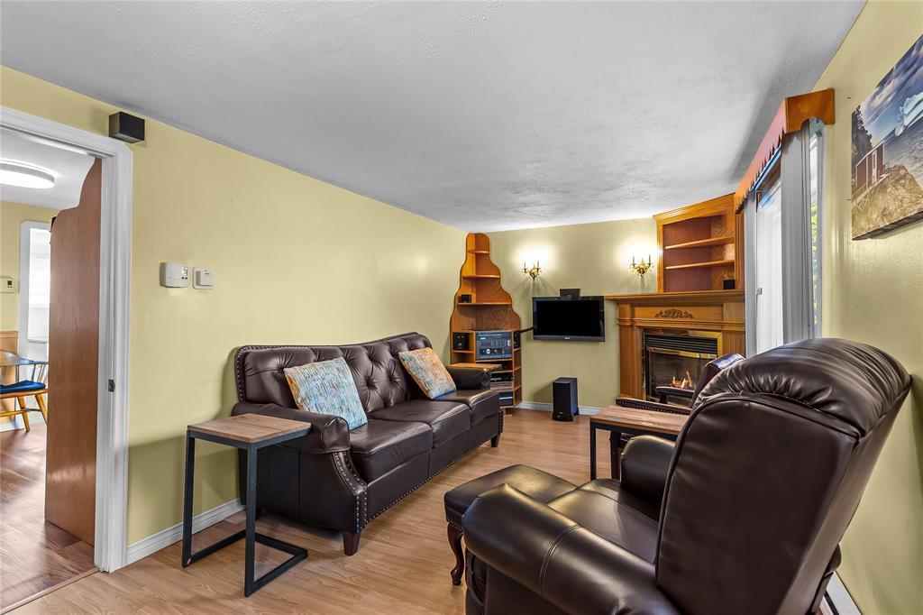 9 Gushue'S Road, Conception Harbour, NL - Indoor Photo Showing Living Room With Fireplace