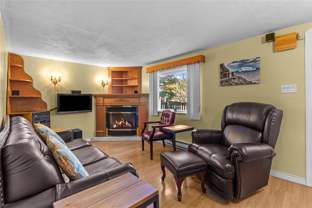 9 Gushue'S Road, Conception Harbour, NL - Indoor Photo Showing Living Room With Fireplace