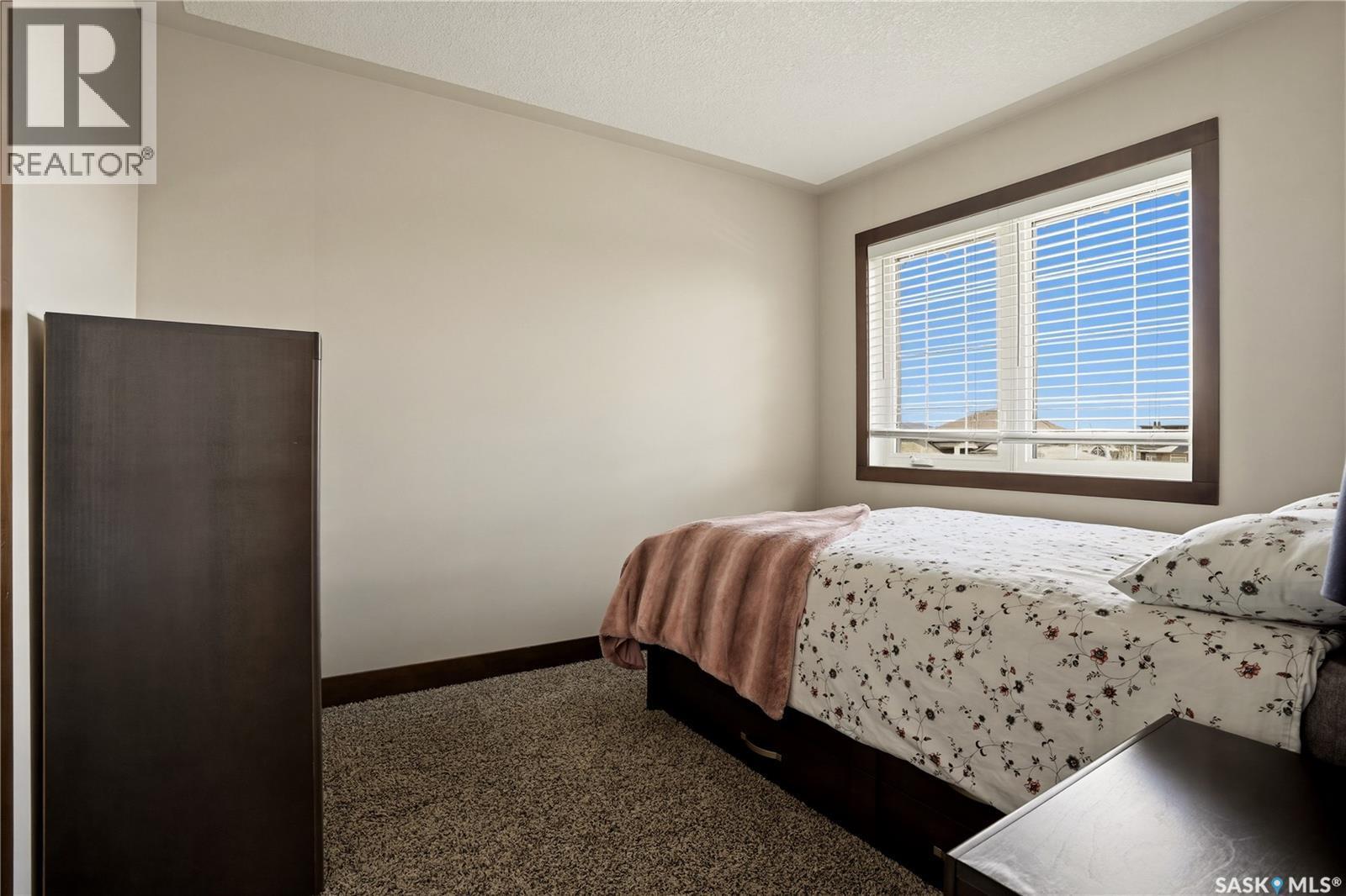 8034 Fairways West Drive, Regina, SK - Indoor Photo Showing Bedroom