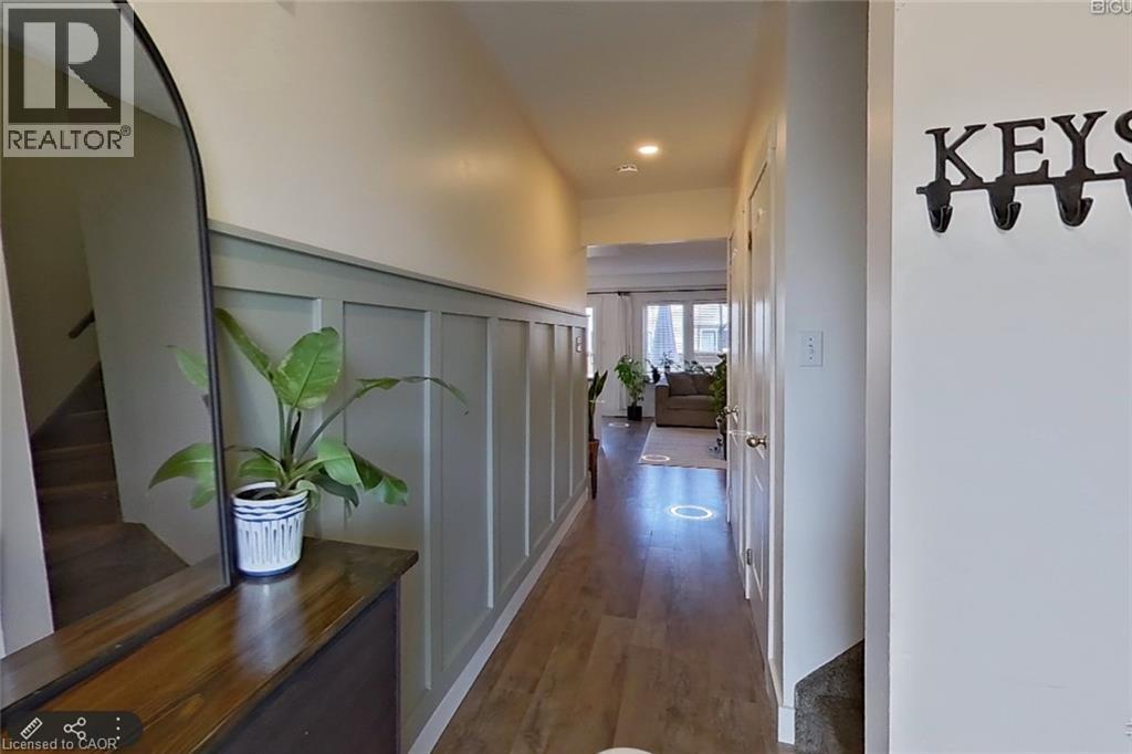 Gorgeous Wainscotting Front Hall - 4 Parkside Crescent, Angus, ON - Indoor Photo Showing Other Room
