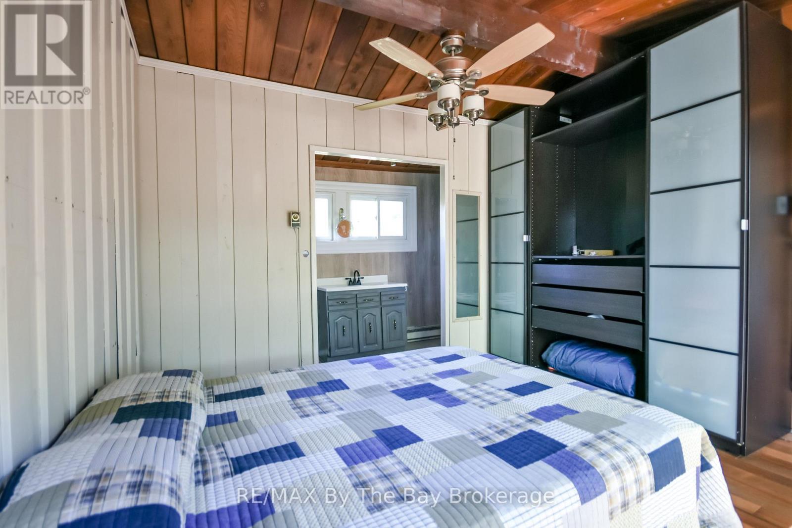 Primary Bedroom with ensuite. - 22 Talon Trail, Tiny, ON - Indoor Photo Showing Bedroom