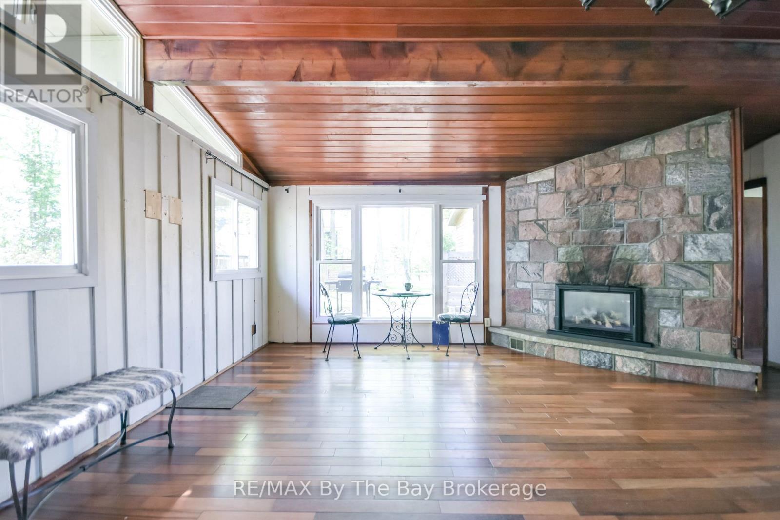 22 Talon Trail, Tiny, ON - Indoor Photo Showing Living Room With Fireplace